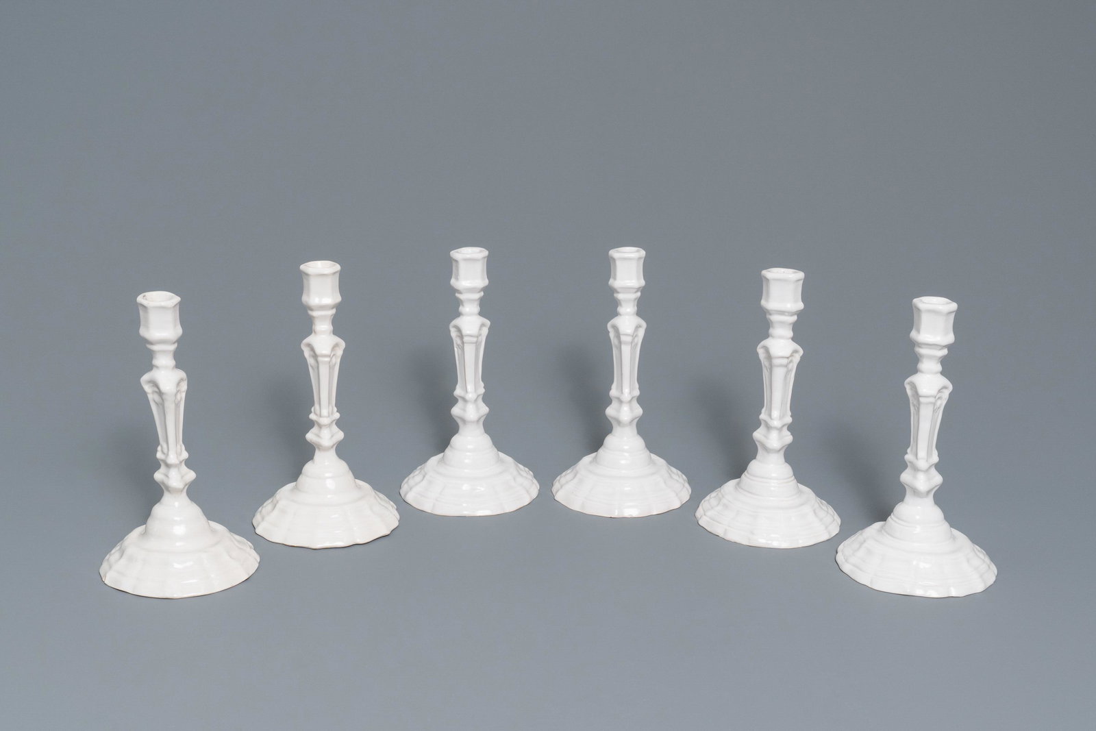 A set of six white Delftware candlesticks, France, 18th: A set of six white Delftware candlesticks, France, 18th C. H.: 23 cm