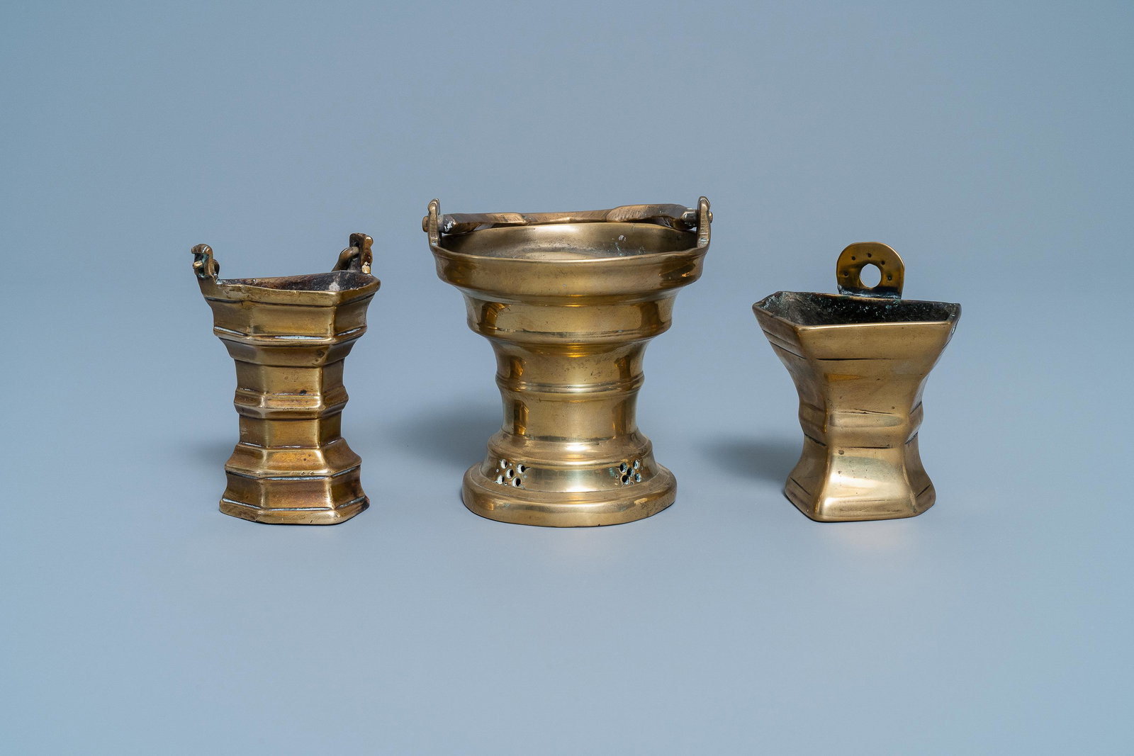 Three Flemish bronze holy water buckets, 16/17th C.: Three Flemish bronze holy water buckets, 16/17th C. H.: 19 cm - Dia.: 10 cm (the middle one)