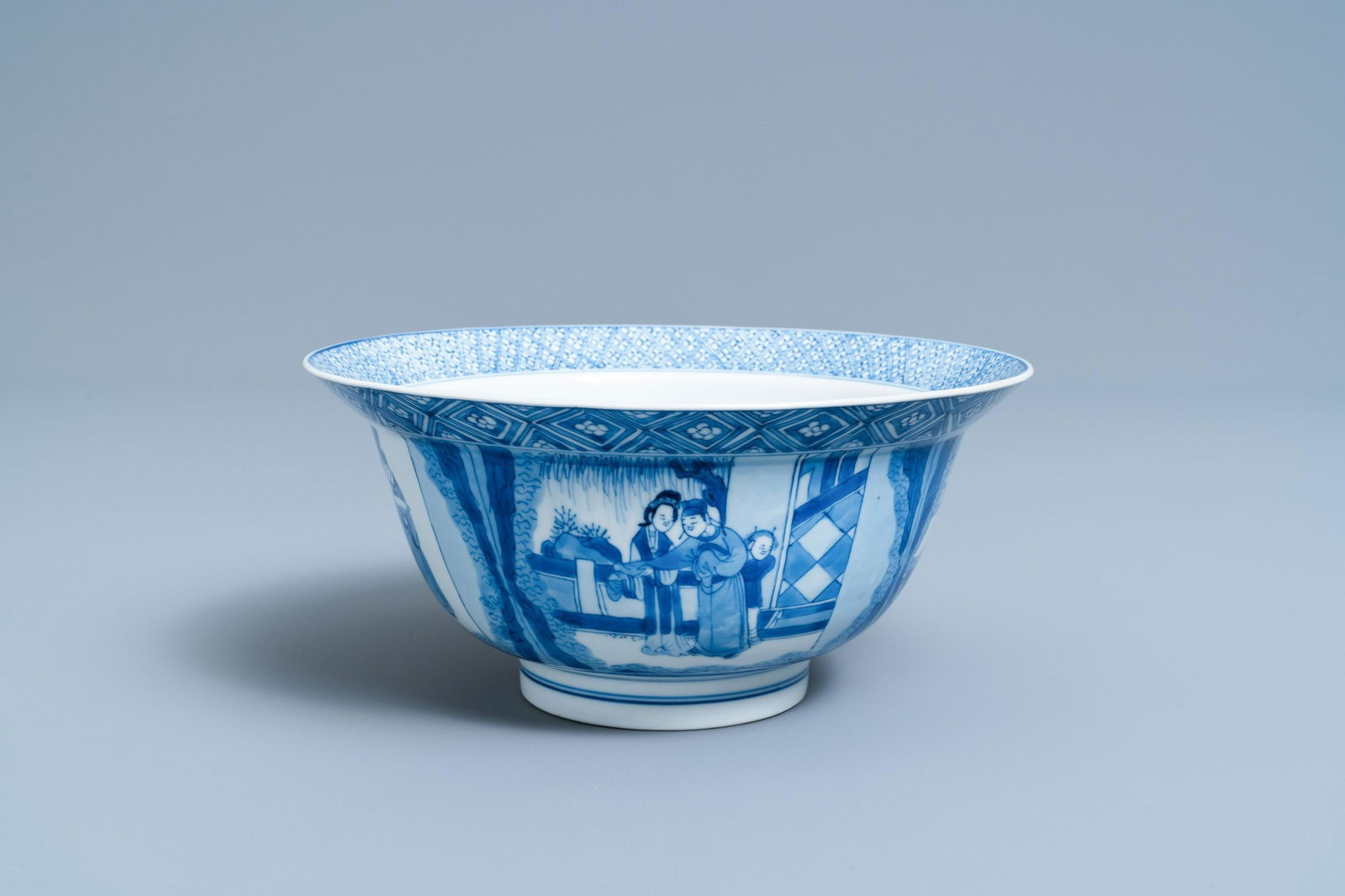 A Chinese blue and white: Full title: A Chinese blue and white 'Xi Xiang Ji' klapmuts bowl, Kangxi mark and of the period Description: Dia.: 20,5 cm - H.: 9,5 cm