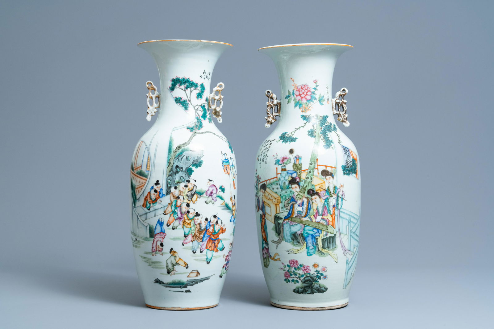 Two Chinese famille rose vases with playing boys and: Full title: Two Chinese famille rose vases with playing boys and ladies playing music, 19/20th C. Description: H.: 57,5 cm (the tallest)