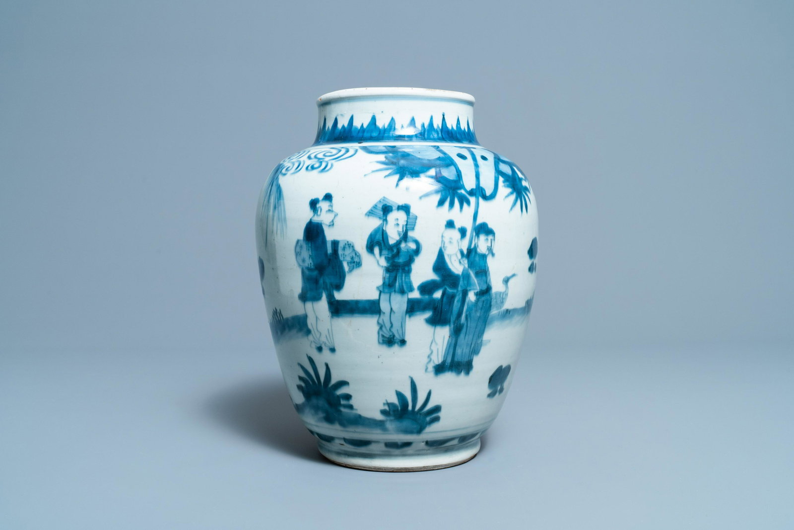 A Chinese blue and white vase with figures in a: Full title: A Chinese blue and white vase with figures in a landscape, Transitional period Description: H.: 31 cm