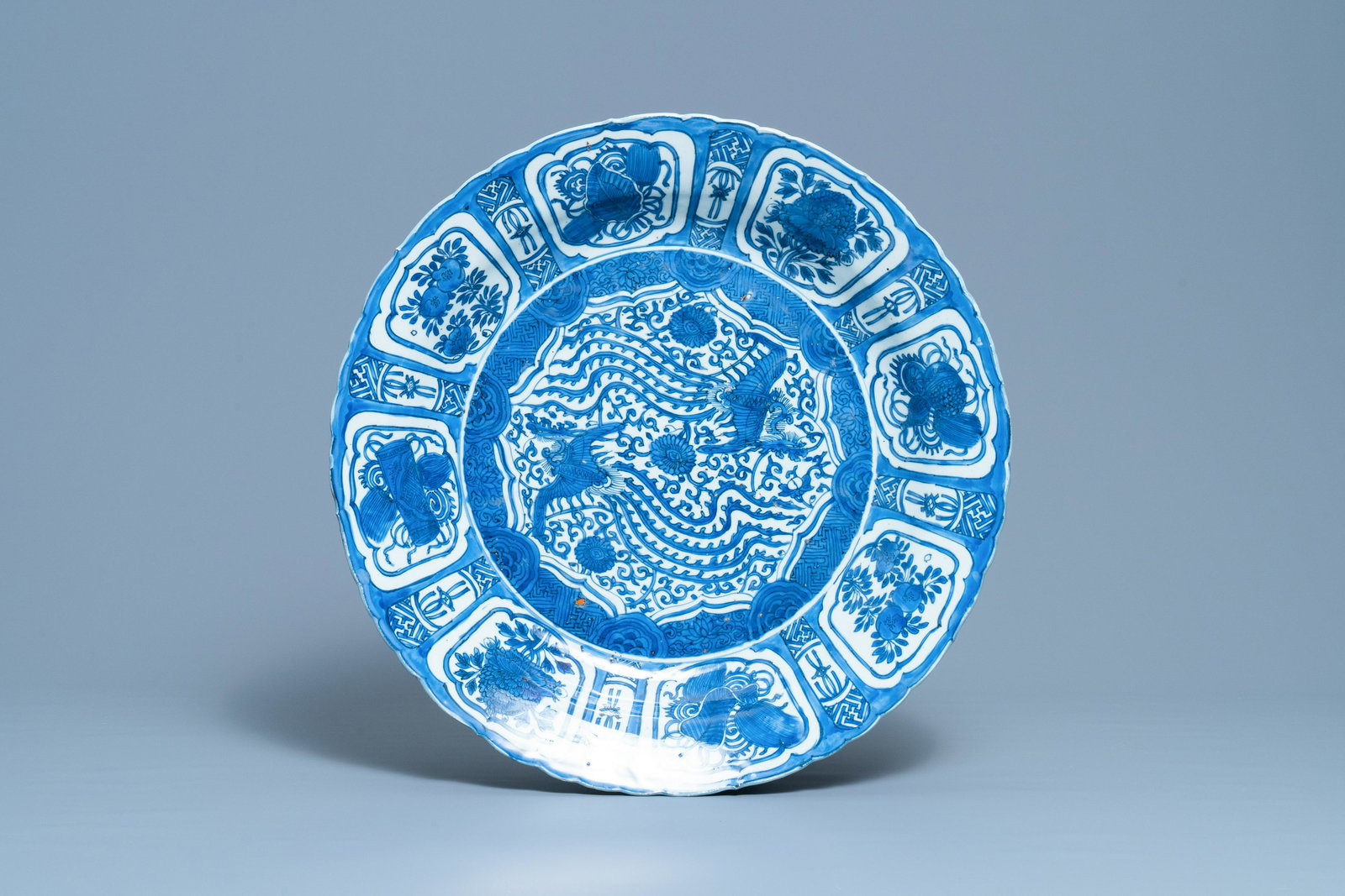 A very large Chinese blue and white kraak porcelain: Full title: A very large Chinese blue and white kraak porcelain 'double phoenix' charger, Wanli Description: Dia.: 51 cm
