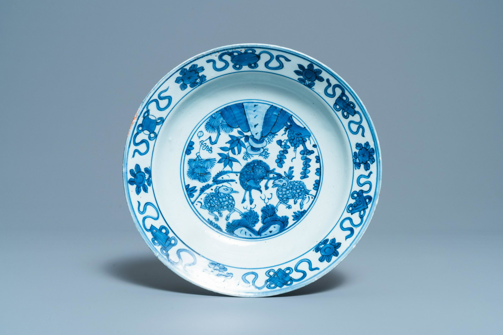 A Chinese blue and white 'three rams' dish, Jiajing: Full title: A Chinese blue and white 'three rams' dish, Jiajing Description: Dia.: 30 cm