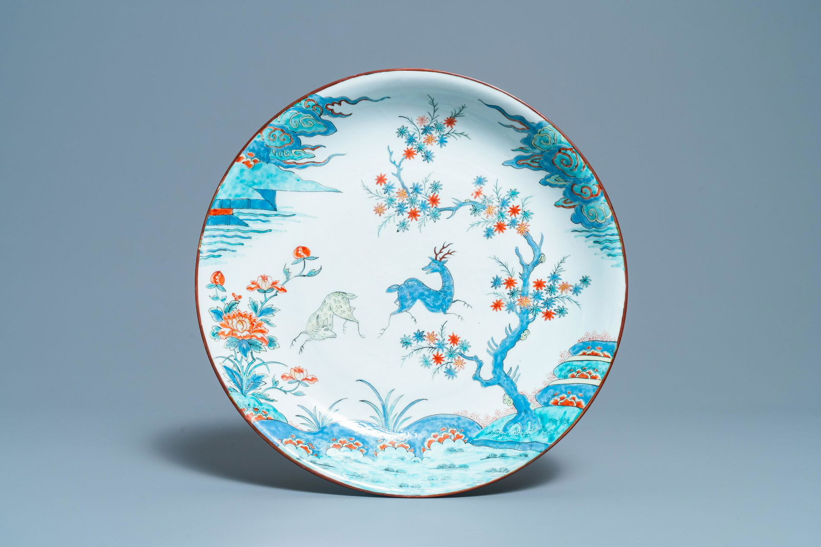 A Chinese Dutch-decorated Kakiemon-style 'deer' dish,: Full title: A Chinese Dutch-decorated Kakiemon-style 'deer' dish, Kangxi Description: Dia.: 35,5 cm