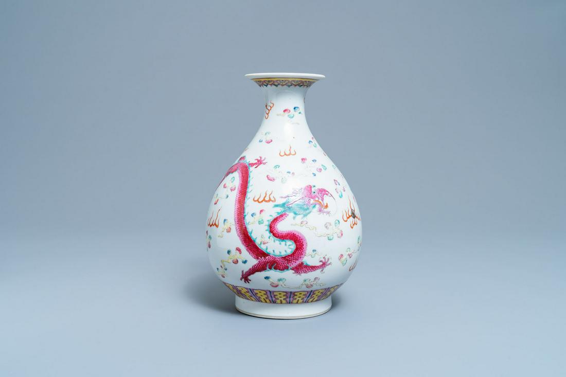 A Chinese famille rose 'dragon and phoenix' vase,: Full title: A Chinese famille rose 'dragon and phoenix' vase, yuhuchunping, Daoguang mark and of the period Description: H.: 29 cm