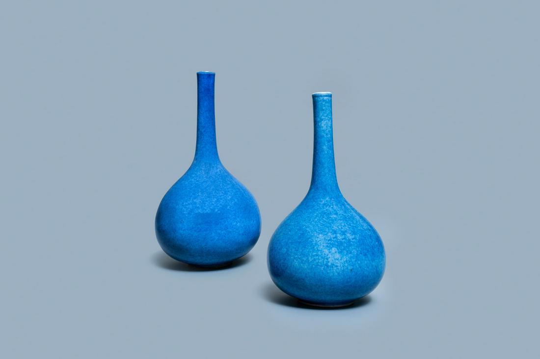 A pair of Chinese monochrome powder blue bottle vases,: Full title: A pair of Chinese monochrome powder blue bottle vases, Kangxi Description: H.: 17,5 cmÊ Provenance: A Belgian private collection.