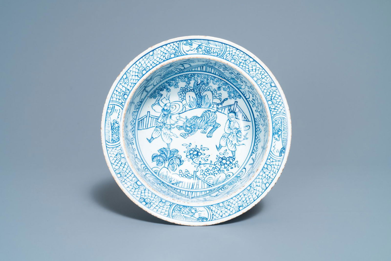 A Chinese blue and white 'tiger' basin, Jiaqing (1 of 6)
