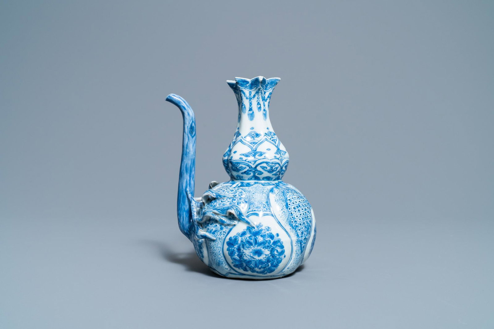 A Chinese blue and white 'pomegranate' kendi, Wanli: Full title: A Chinese blue and white 'pomegranate' kendi, Wanli Description: H.: 19 cm - L.: 16,5 cm