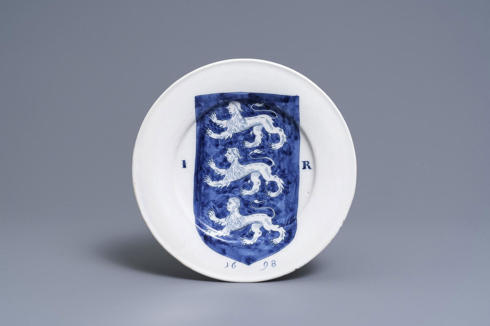 A Dutch Delft blue and white dish with the arms of (1 of 2)