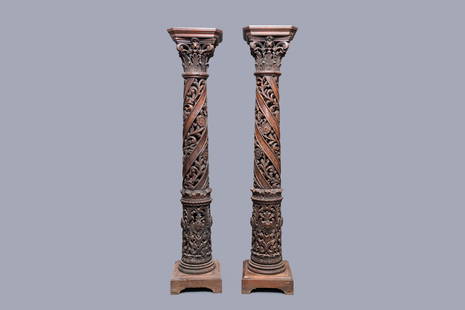 A pair of reticulated carved oak Corinthian columns: Full title: A pair of reticulated carved oak Corinthian columns with cherub heads and vines, 17th C. Description: H.: 175 cm Provenance: - The Davioud-Larminet collection, Lille, France.