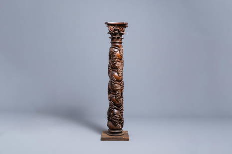 A carved walnut Ionic column with grapevines, 17th C.: Full title: A carved walnut Ionic column with grapevines, 17th C. Description: H.: 128 cm Provenance: - The Davioud-Larminet collection, Lille, France. Expert: Laurence Fligny. Condition