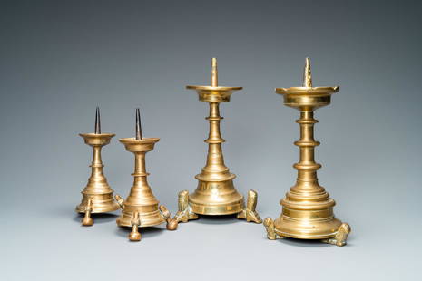 Four bronze candlesticks, Flanders or Germany, 15/16th: Full title: Four bronze candlesticks, Flanders or Germany, 15/16th C. Description: H.: 33 - 23 cm Provenance:- The Davioud-Larminet collection, Lille, France. Condition reports and additional