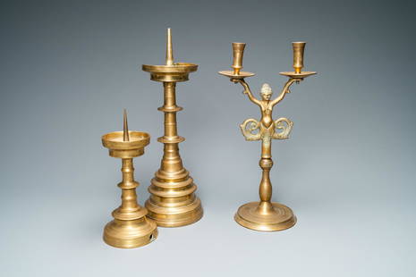 Three bronze candlesticks, Flanders and Germany, 16th: Full title: Three bronze candlesticks, Flanders and Germany, 16th C. Description: H.: 44,5 - 41,5 - 28 cm Provenance: - The Davioud-Larminet collection, Lille, France. Condition reports and