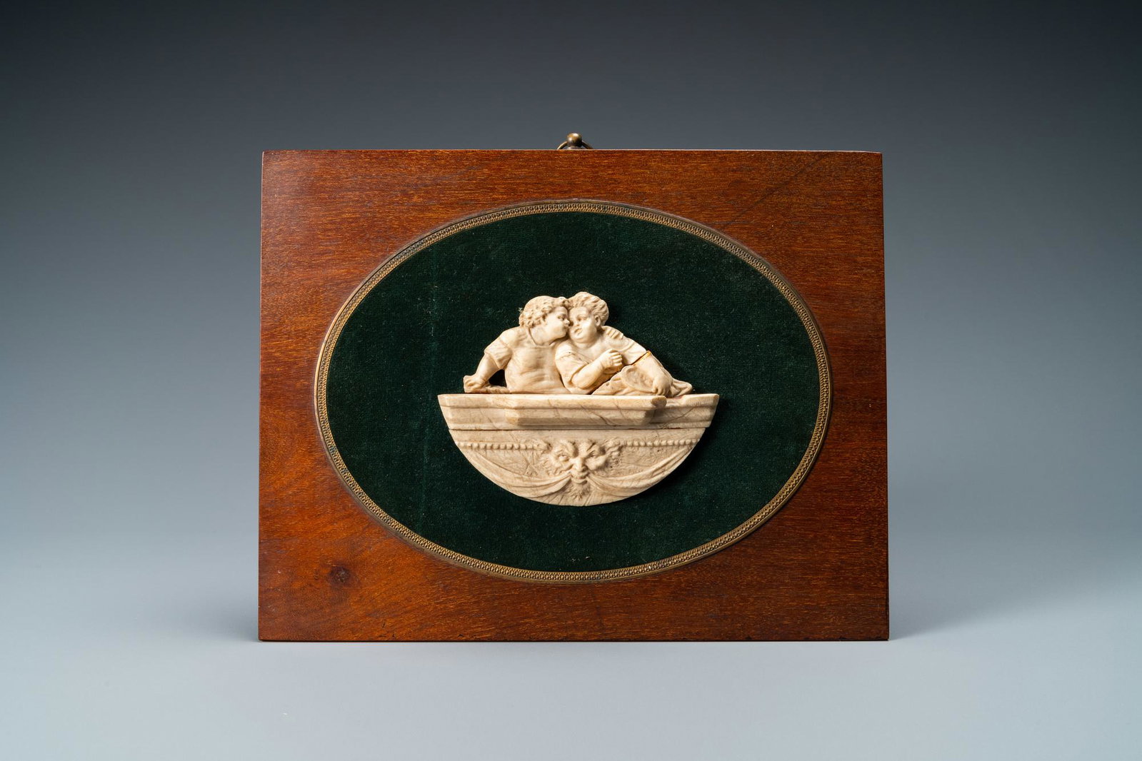 A bone carving depicting two children, 19th C.: Lot subject to CITES-regulations. Available for sale in the European Union only. For exporting outside of the European Union, a CITES export permit must be obtained. We can obtain this for and at the 