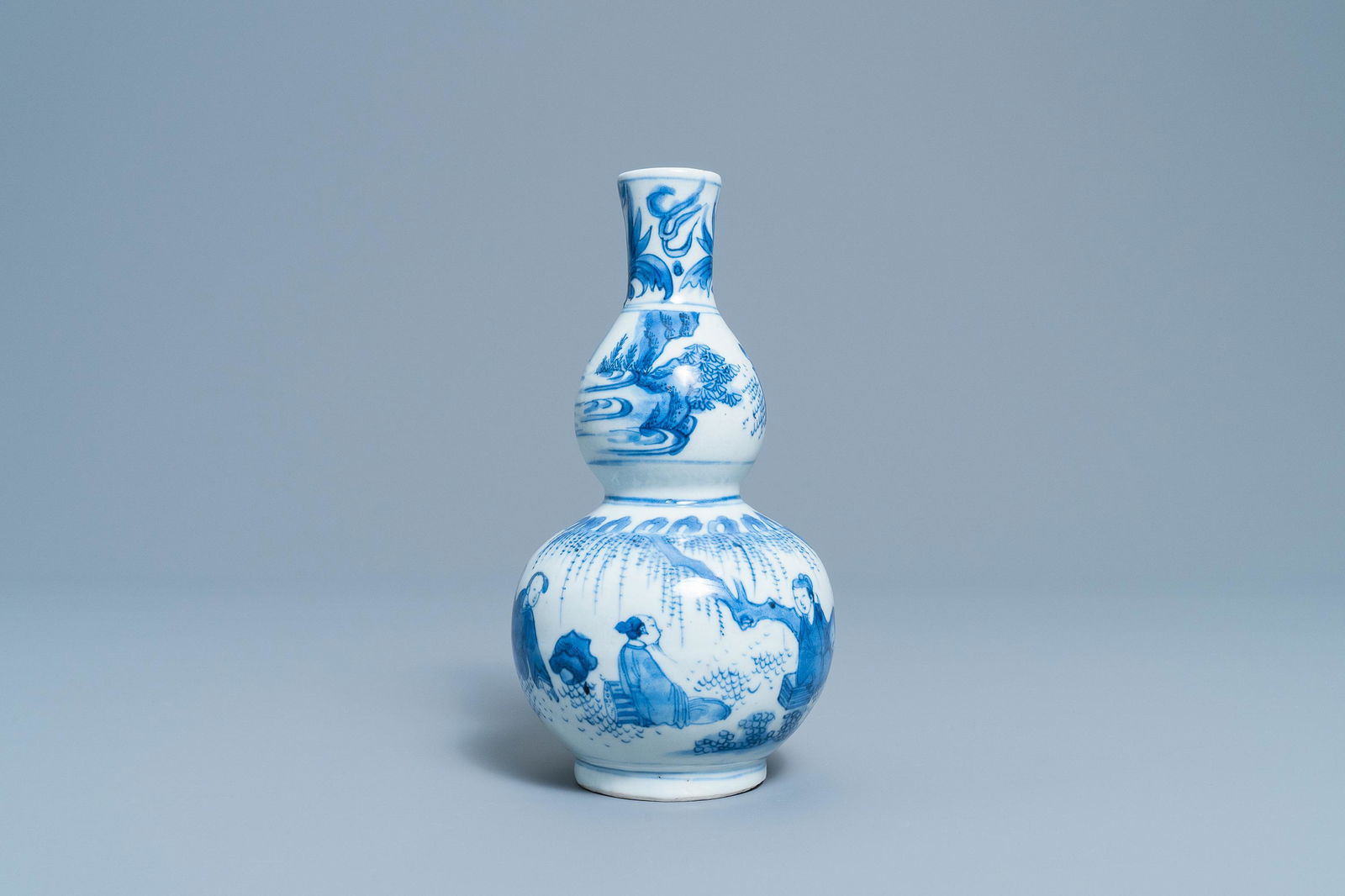 A Chinese blue and white double gourd vase with figures (1 of 20)