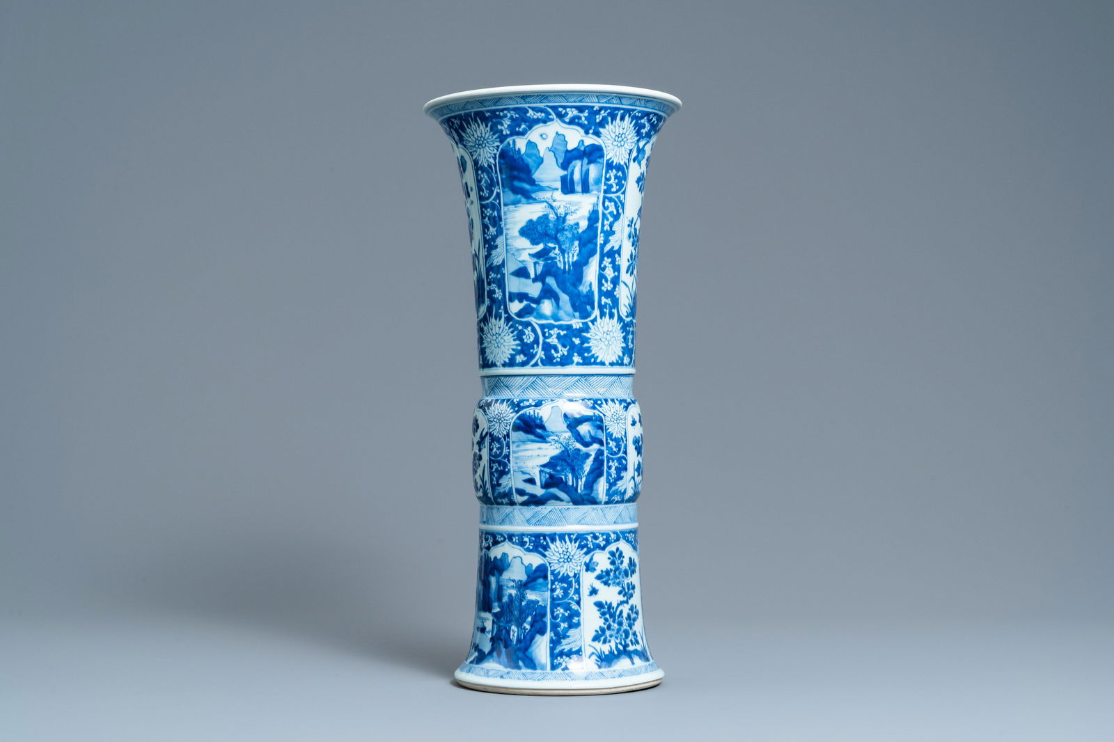 A Chinese blue and white 'gu' vase with floral and (1 of 6)