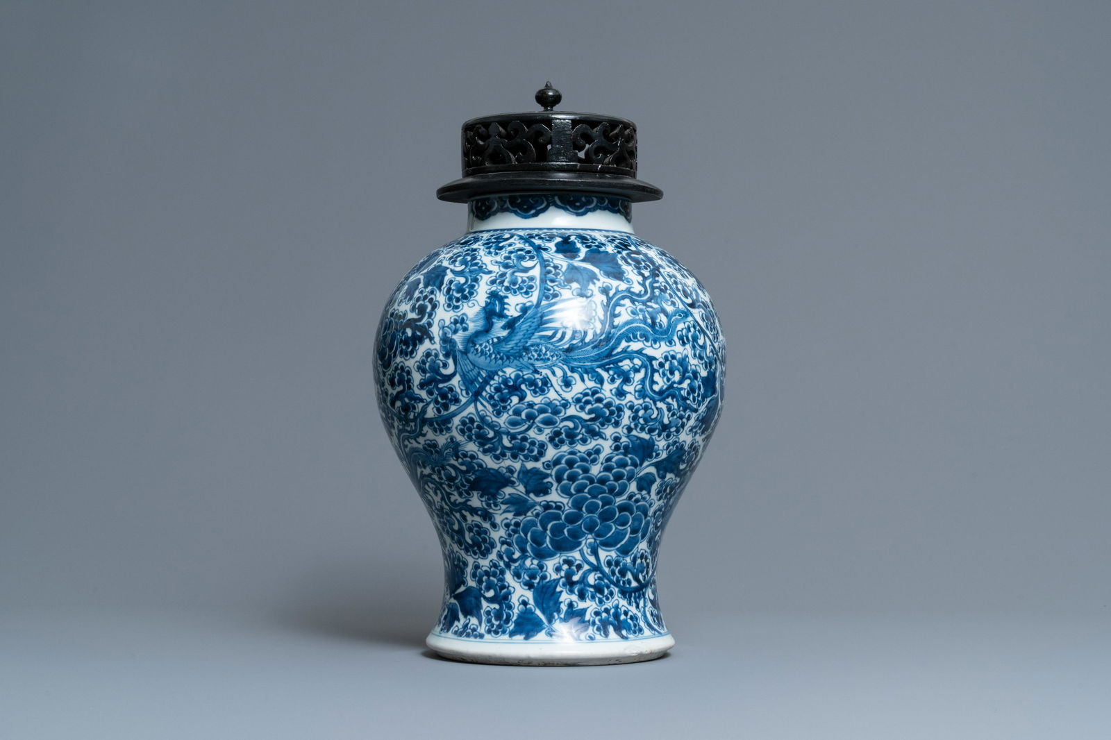 A Chinese blue and white 'phoenixes' vase, Kangxi: Full title: A Chinese blue and white 'phoenixes' vase, Kangxi Description: H.: 42,5 cm (incl. the cover) H.: 34 cm (the vase) The absence of a condition report does not imply that a lot is in perfect