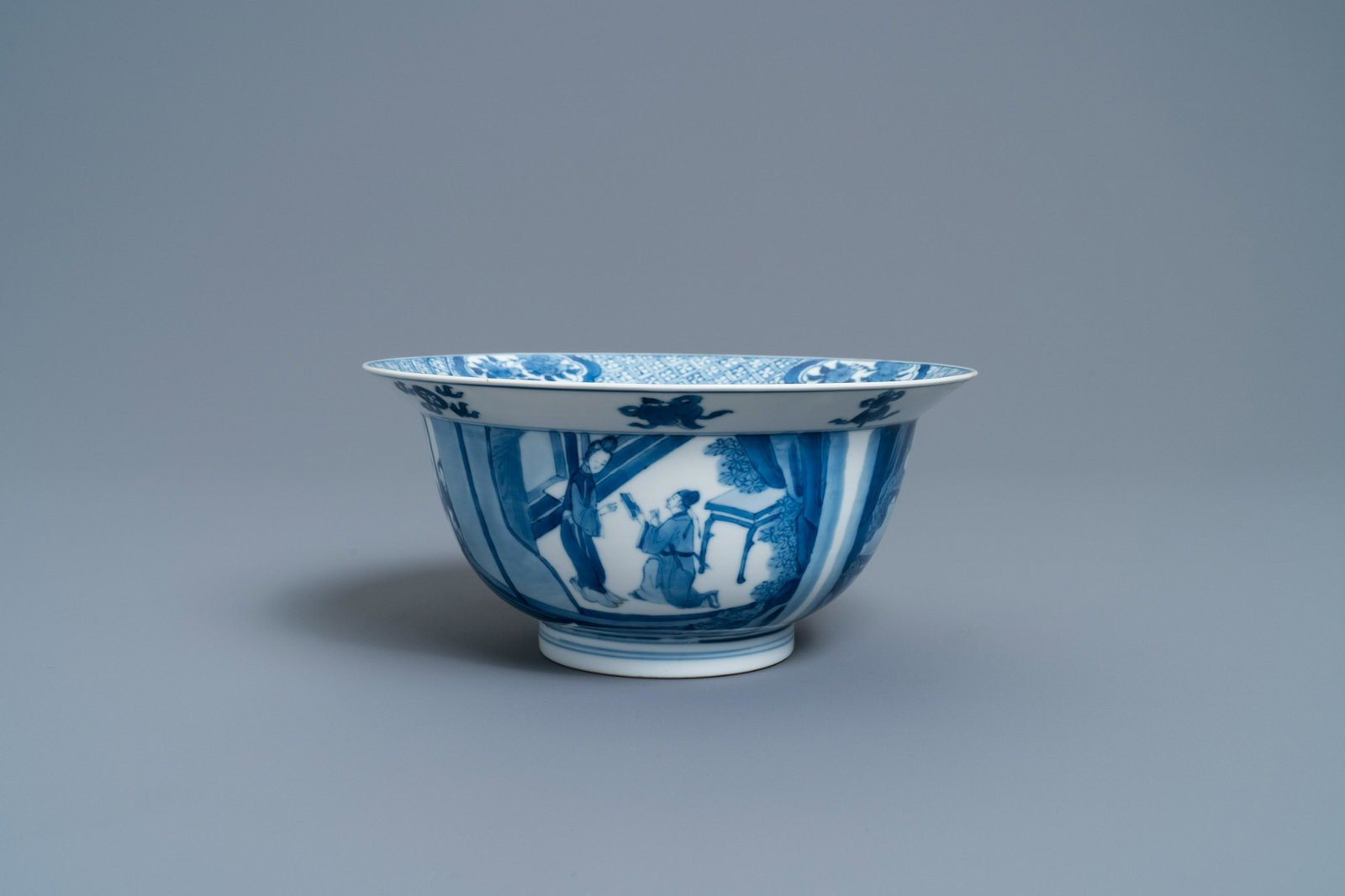 A Chinese blue and white 'klapmuts' bowl, Chenghua: Full title: A Chinese blue and white 'klapmuts' bowl, Chenghua mark, Kangxi Description: Dia.: 20 cm - H.: 9,5 cm Provenance: - A Dutch private collection. - Acquired from Kunstgalerie 'Het Loo', Apel