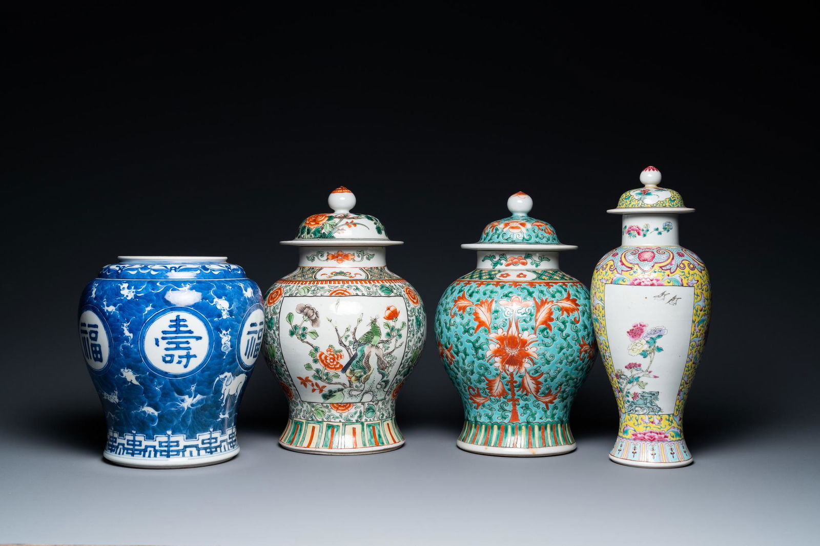 Four various Chinese famille rose, verte and blue and white vases, 19/20th C. (1 of 9)