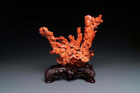 A large Chinese carved red coral group with two ladies surrounded by birds, fish and flowers, 19th