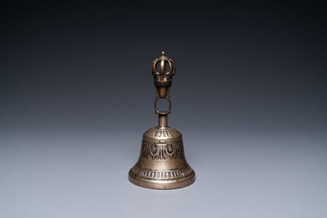 A Tibetan bronze bell, 16th C.: Full title: A Tibetan bronze bell, 16th C. Description: H.: 17,5 cm The absence of a condition report does not imply that a lot is in perfect condition. Please contact us to let us know which lots