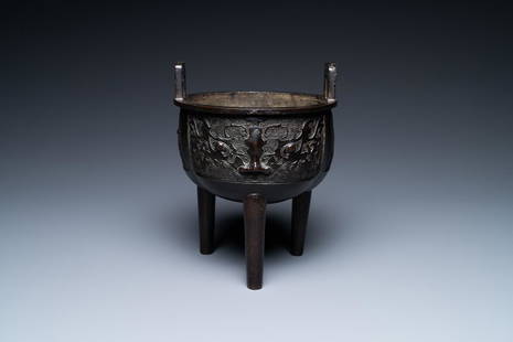 A Chinese bronze tripod censer with 'taotie' masks, Ming: Full title: A Chinese bronze tripod censer with 'taotie' masks, Ming Description: H.: 21 cm - L.: 15 cm The absence of a condition report does not imply that a lot is in perfect condition. Please