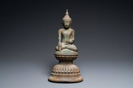 A Burmese bronze Shan-style figure of Buddha, Myanmar, 16th C.: Full title: A Burmese bronze Shan-style figure of Buddha, Myanmar, 16th C. Description: H.: 36 cm The absence of a condition report does not imply that a lot is in perfect condition. Please