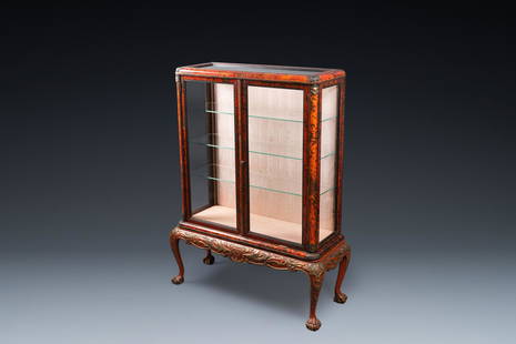 A tortoise veneer display cabinet on painted wooden stand, Maison Franck, Antwerp, ca. 1900: Full title: A tortoise veneer display cabinet on painted wooden stand, Maison Franck, Antwerp, ca. 1900 Description: Dim.: 143 x 109 x 41,5 cm The absence of a condition report does not imply that a l