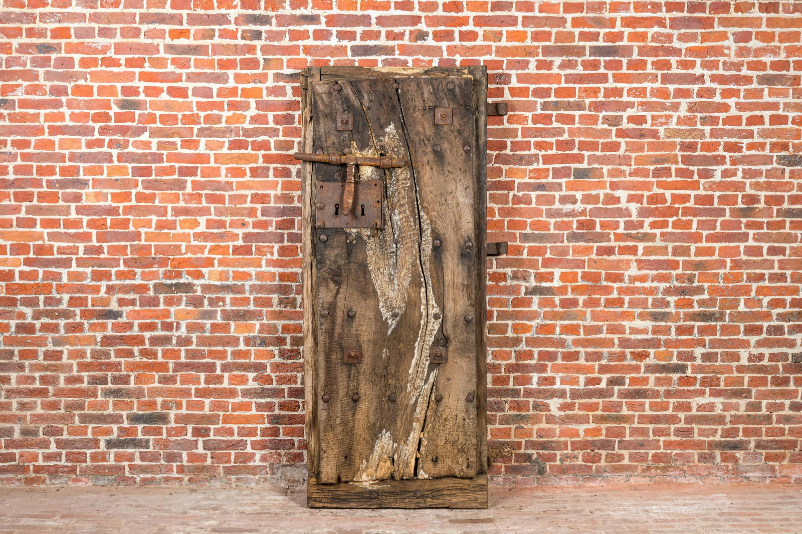 A wooden door with wrought iron lock and hinges, 17/18th C. (1 of 3)