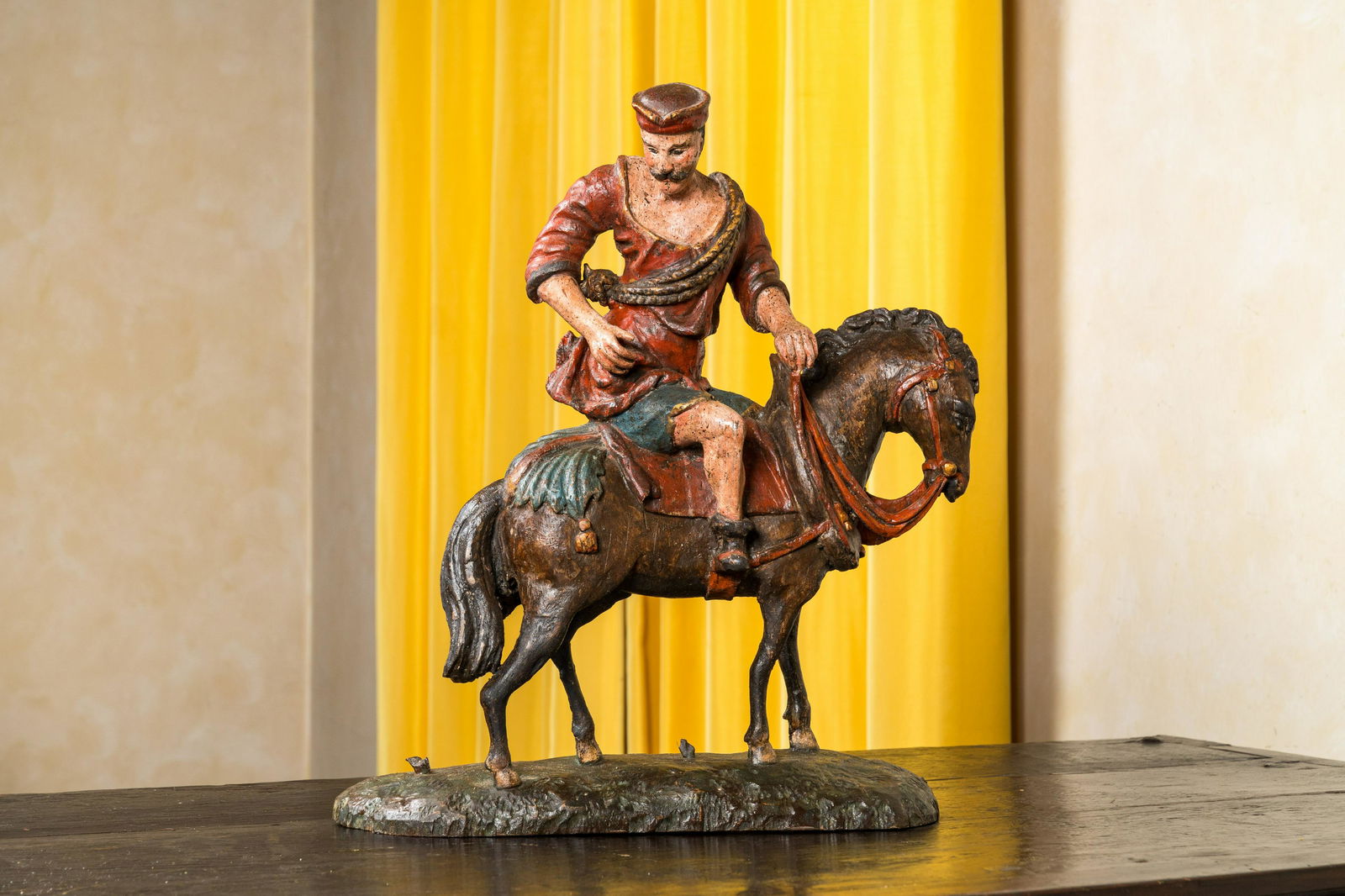A Flemish polychrome oak figure of Saint Martin on horseback, probably Antwerp, 16th C. (1 of 3)