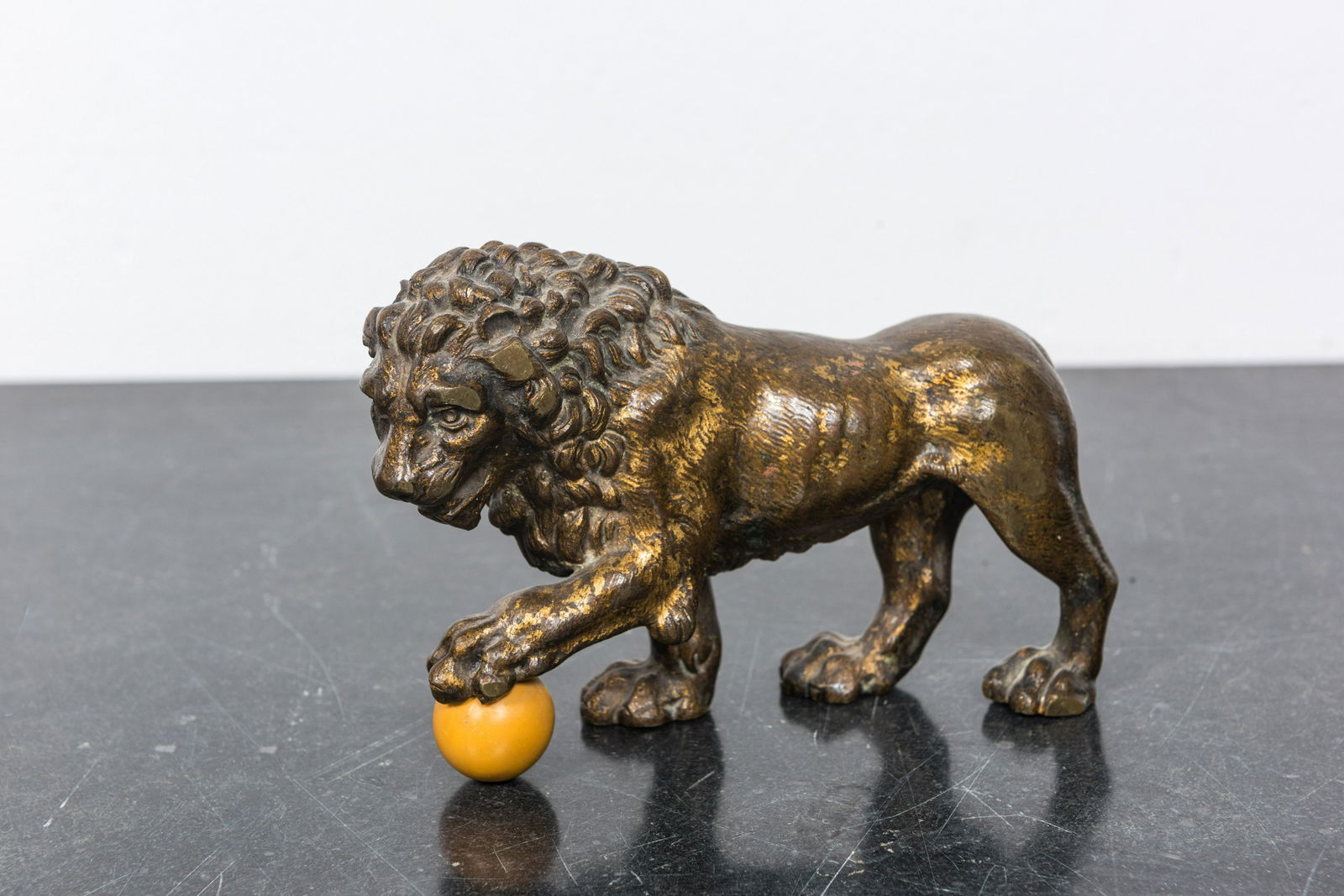 A gilt bronze model of a lion, 19th C. (1 of 2)