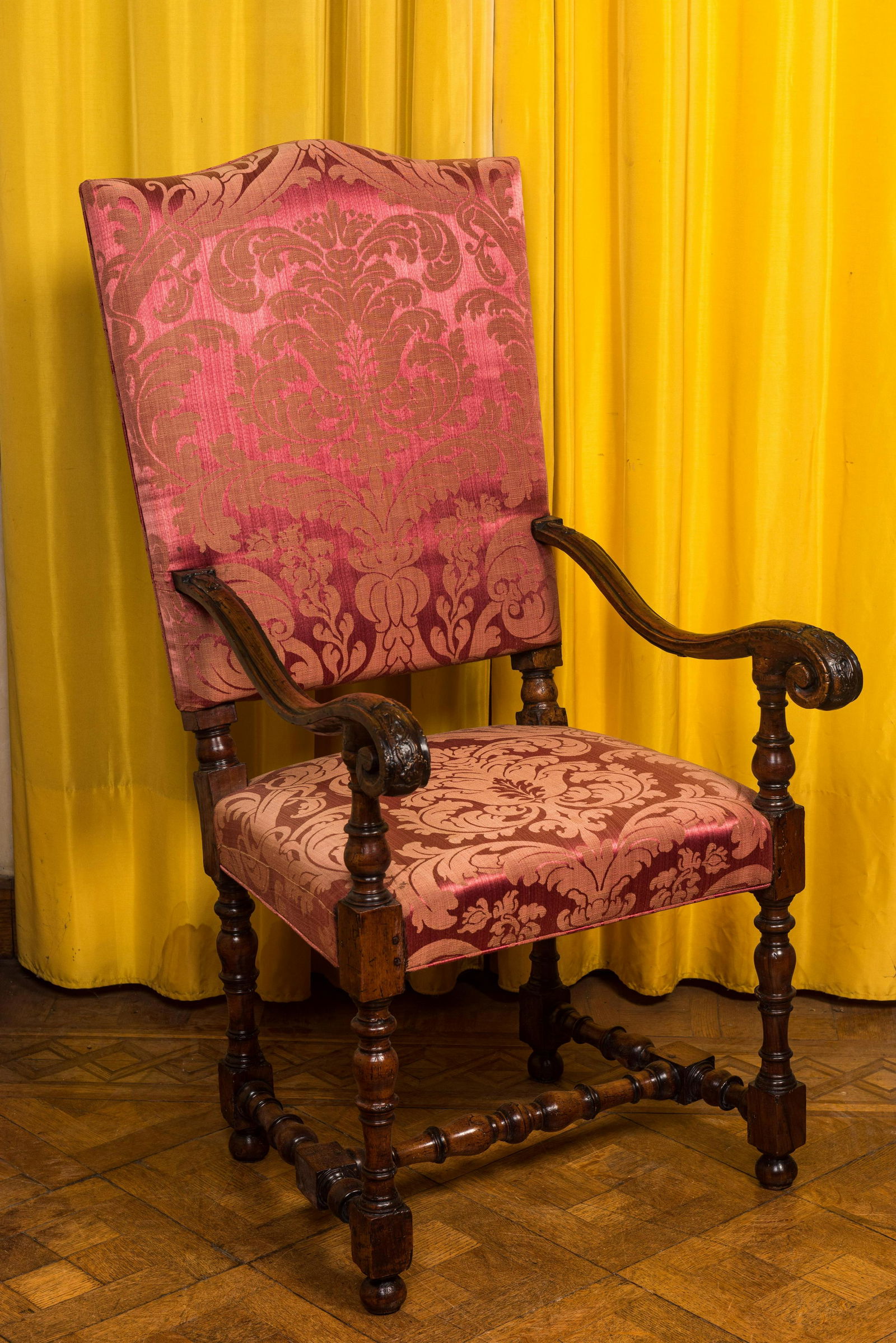 A wooden armchair with red velvet lining, 18th C. (1 of 3)