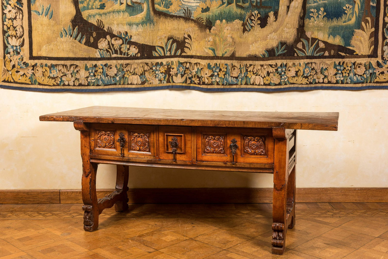 A Spanish walnut table with three drawers, 17th C. (1 of 4)