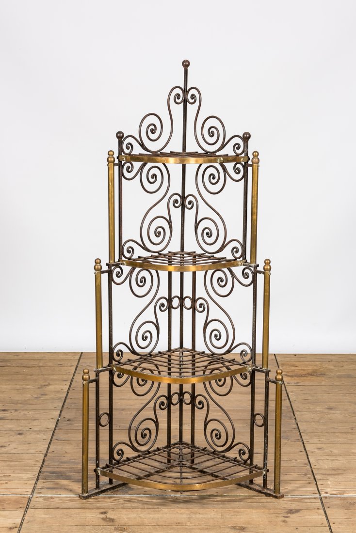 A wrought iron and brass corner stand for plants, 20th C. (1 of 2)