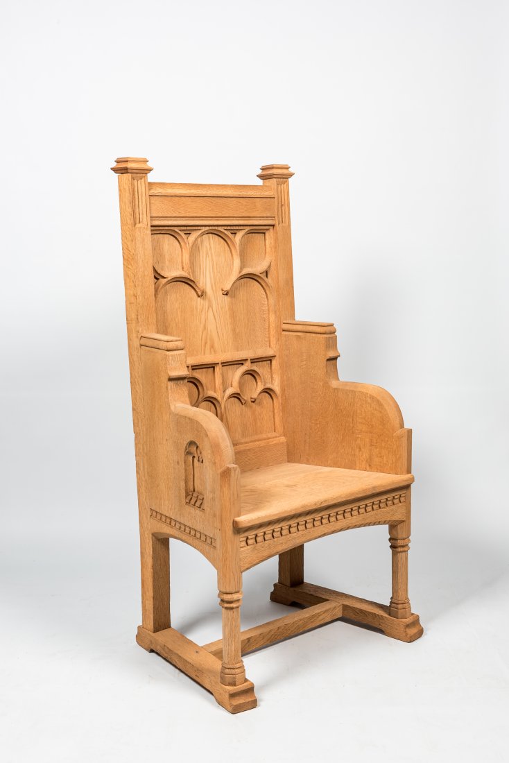 A French Gothic Revival white oak wooden armchair, 20th C. (1 of 2)