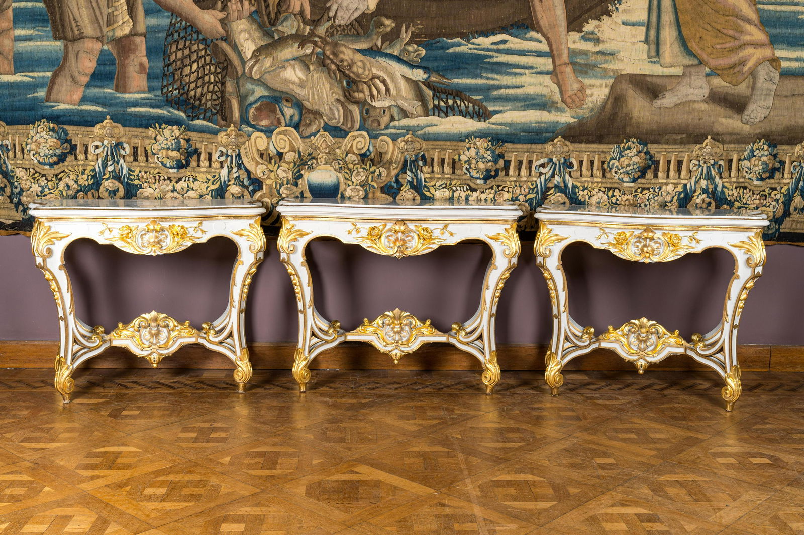 A pair of painted and gilt wooden rocaille console tables and a jardiniÃ¨re, France, 19/20th C. (1 of 4)