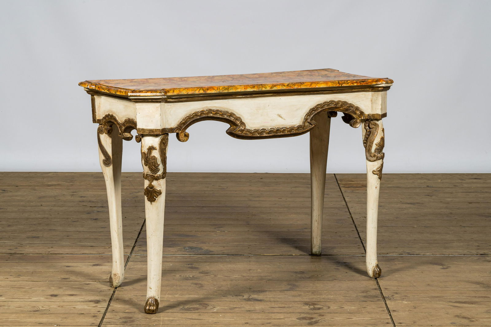 A painted wooden faux marbre table, Italy, 19th C. (1 of 2)