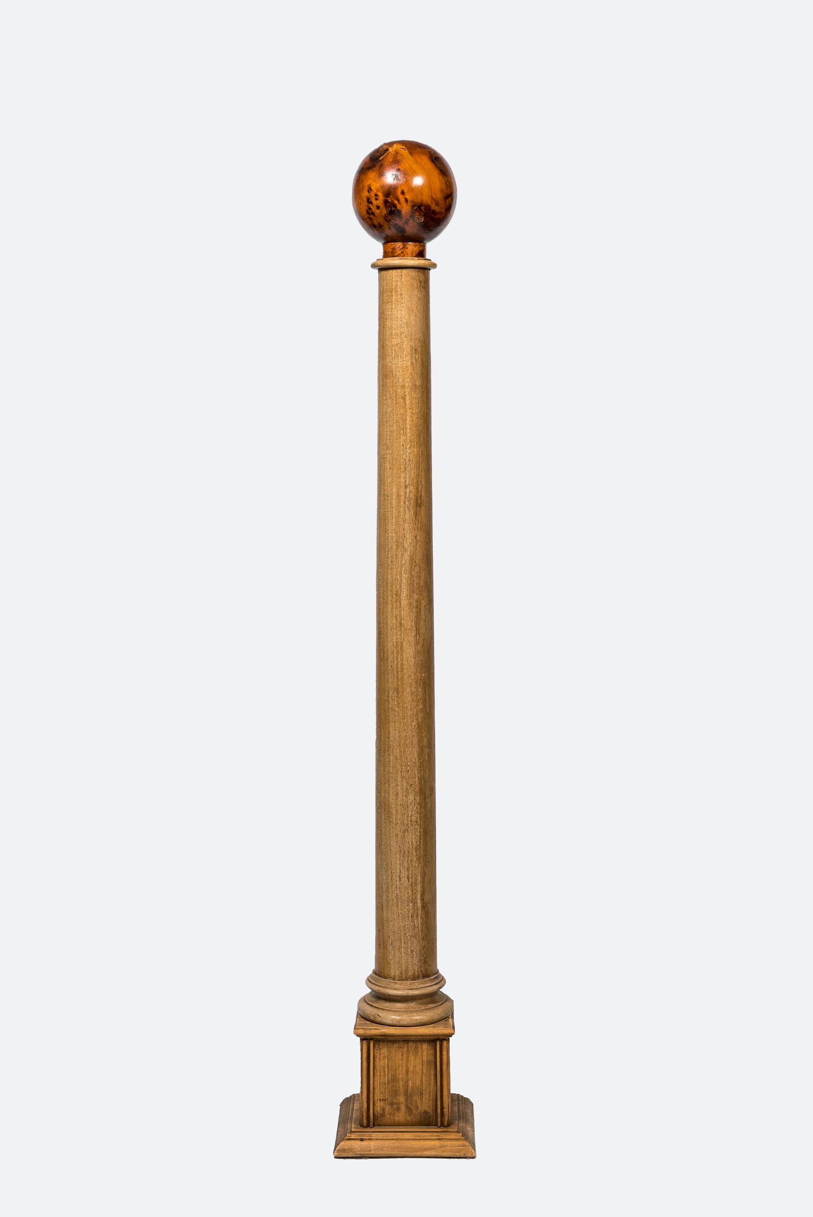 A large decorative wooden column topped with a root wood sphere, 20th C. (1 of 1)