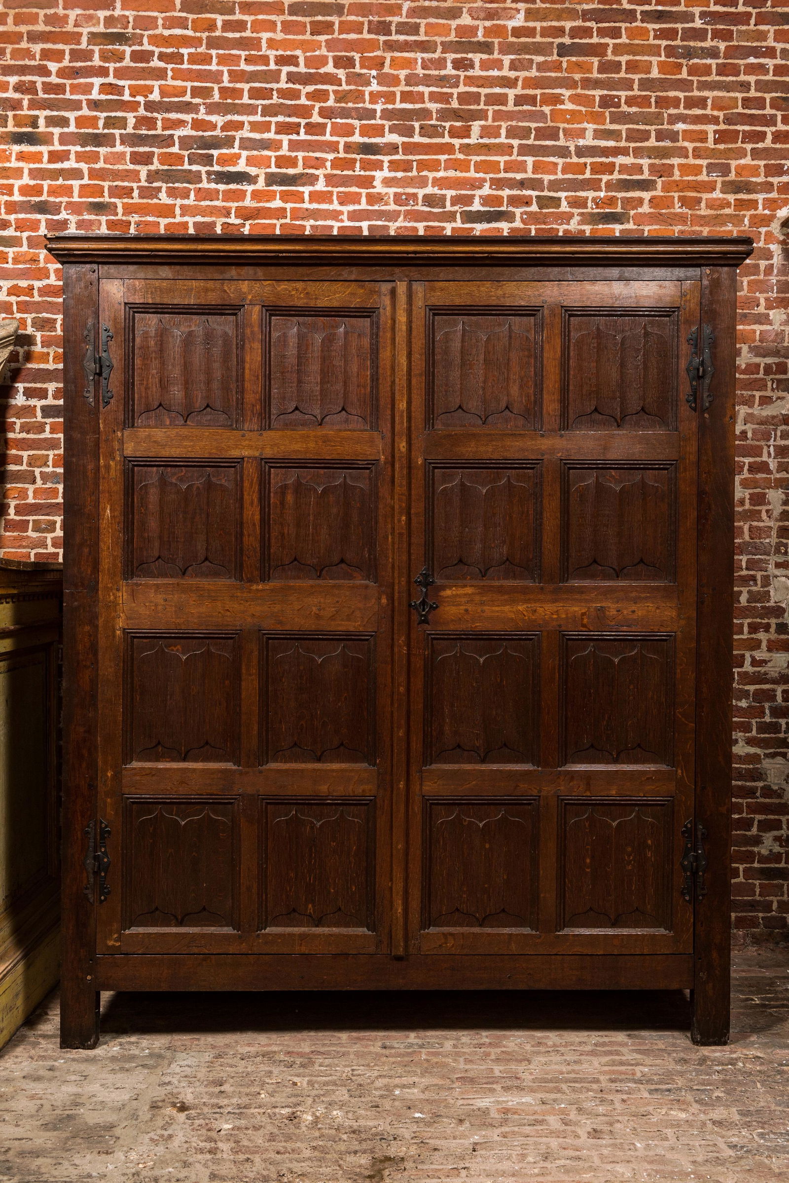 A Flemish gothic oak two-door cabinet with linenfold panels, 16th C. with later elements (1 of 4)