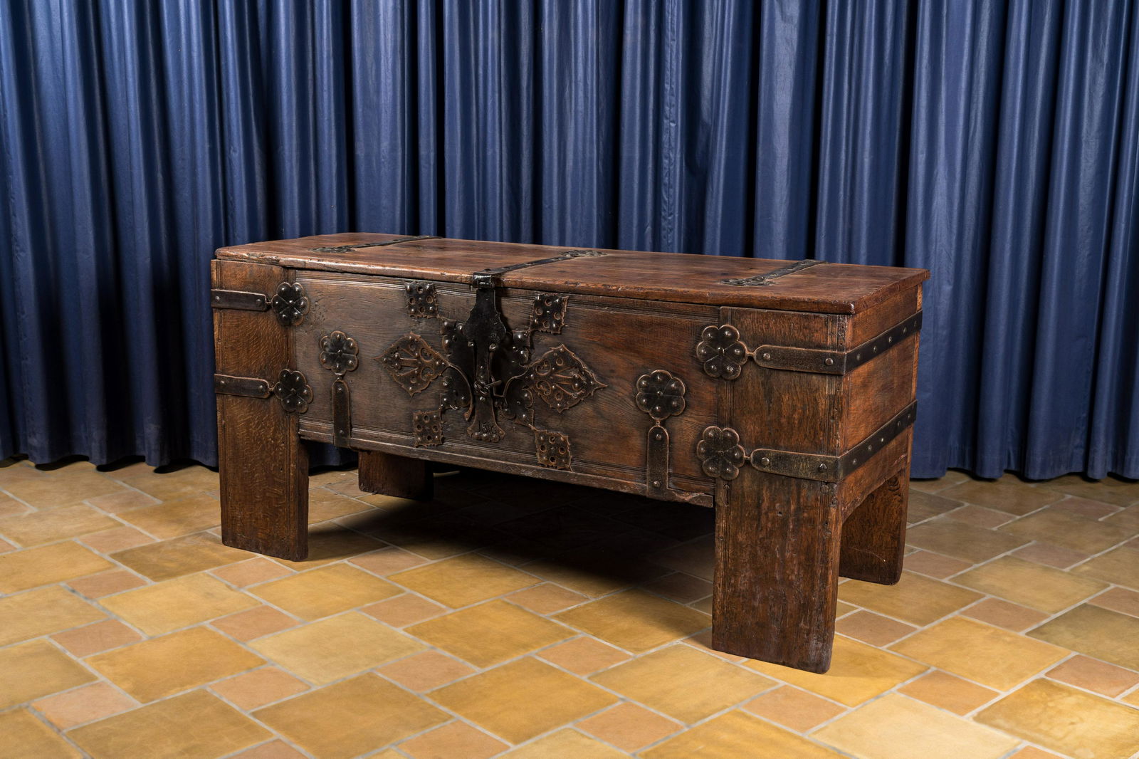 A large German rectangular wooden 'Stollentruhe' chest with iron and brass mounts, Westphalia, 17th (1 of 3)