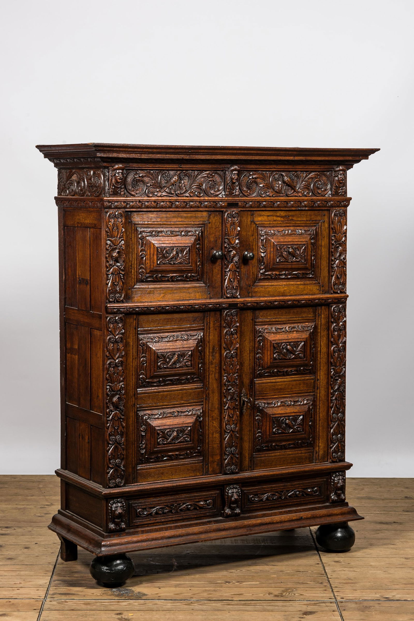 A finely sculpted Flemish oak four-door cabinet, late 17th C. (1 of 7)