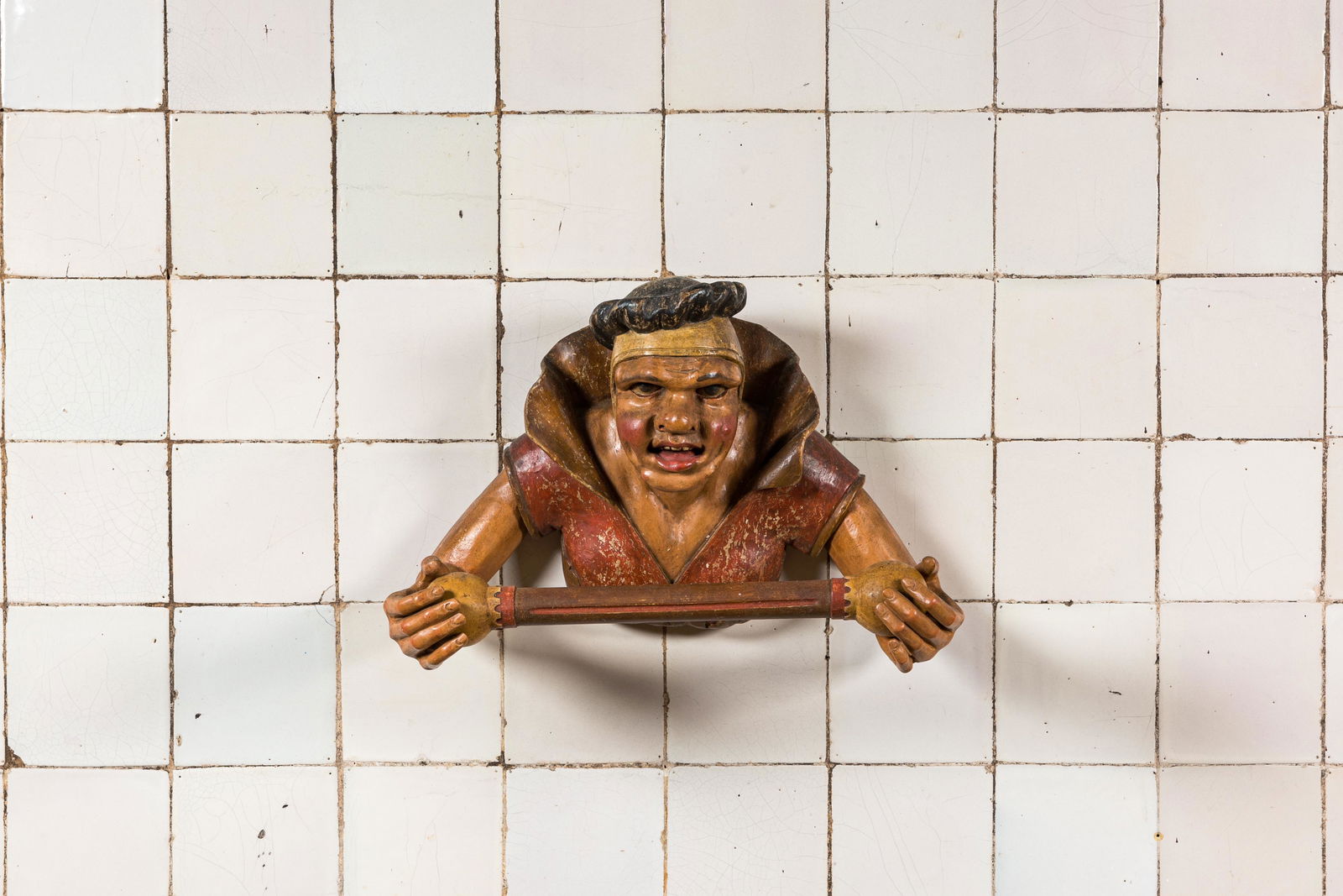 A rare polychromed wooden towel rack in the shape of a cook, 19th C. (1 of 2)
