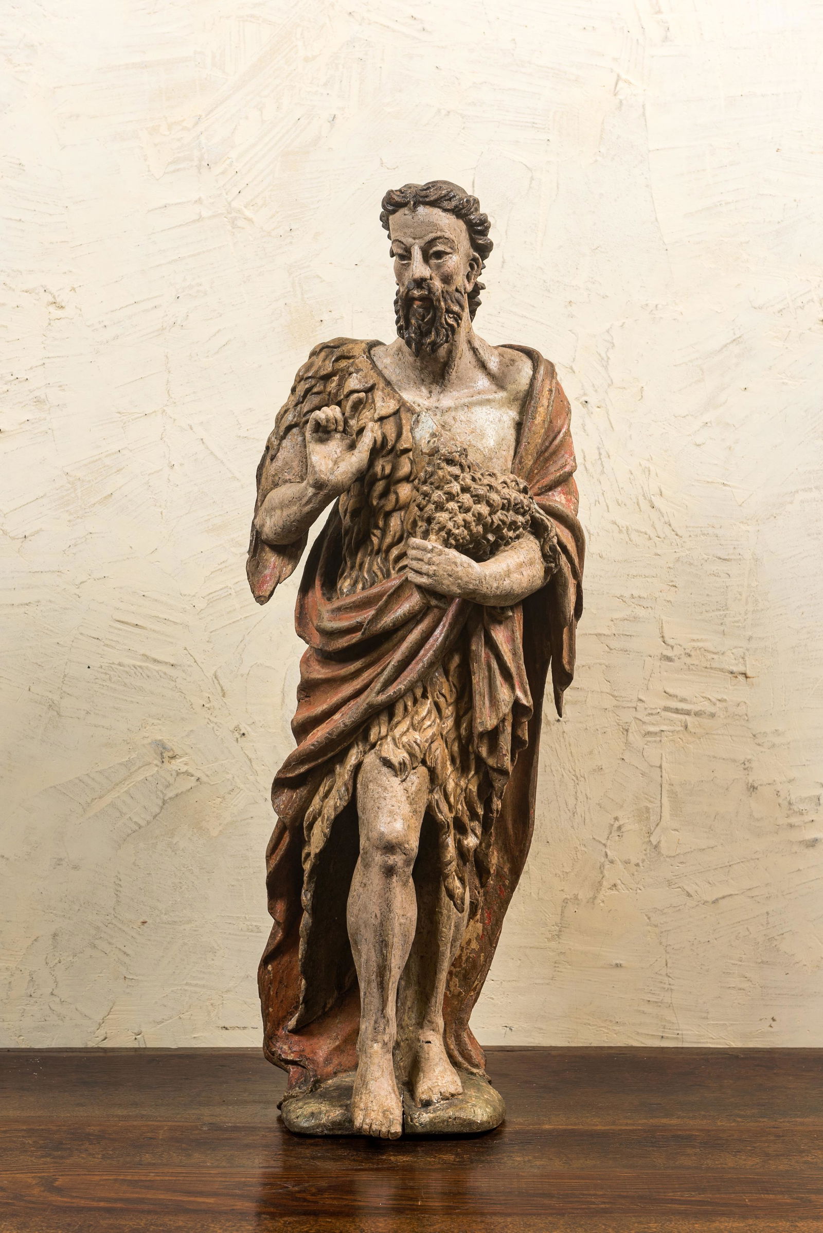 A large polychrome oak figure of John the Baptist, early 17th C. (1 of 3)
