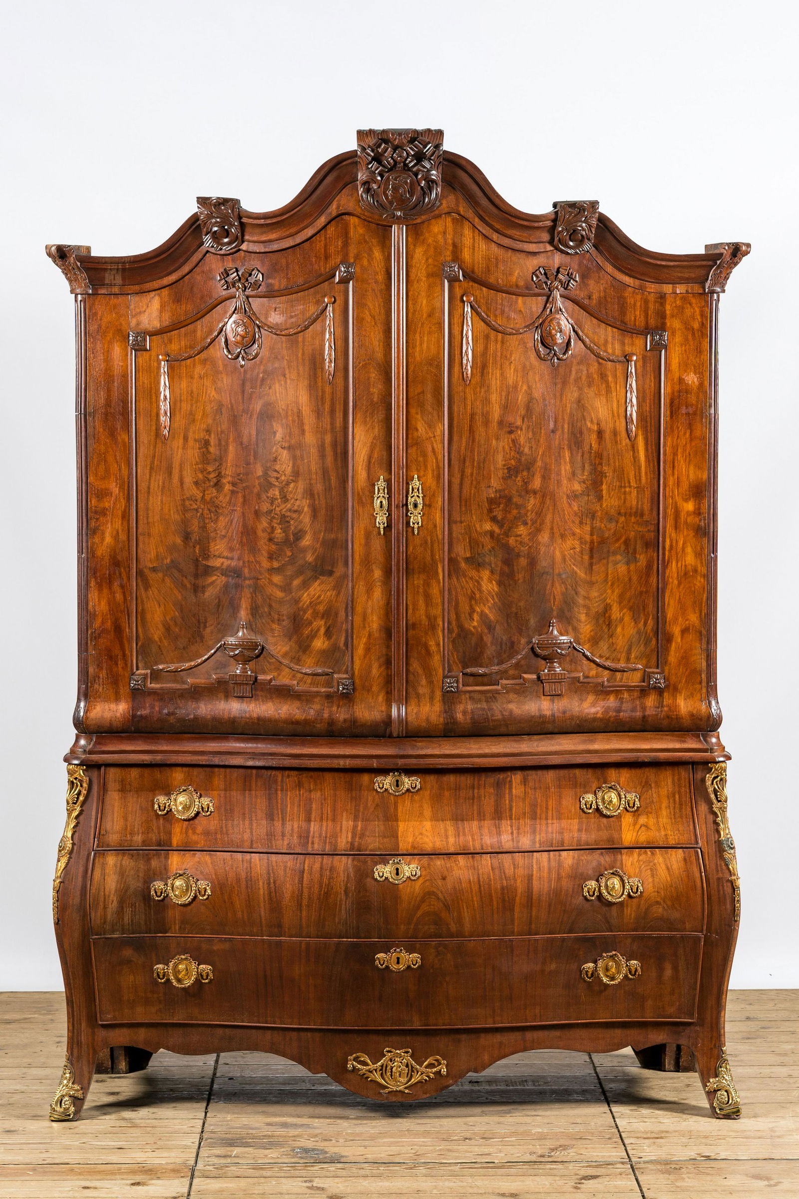 A Dutch mahogany veneered cabinet with two doors and three drawers, 18th C. (1 of 8)