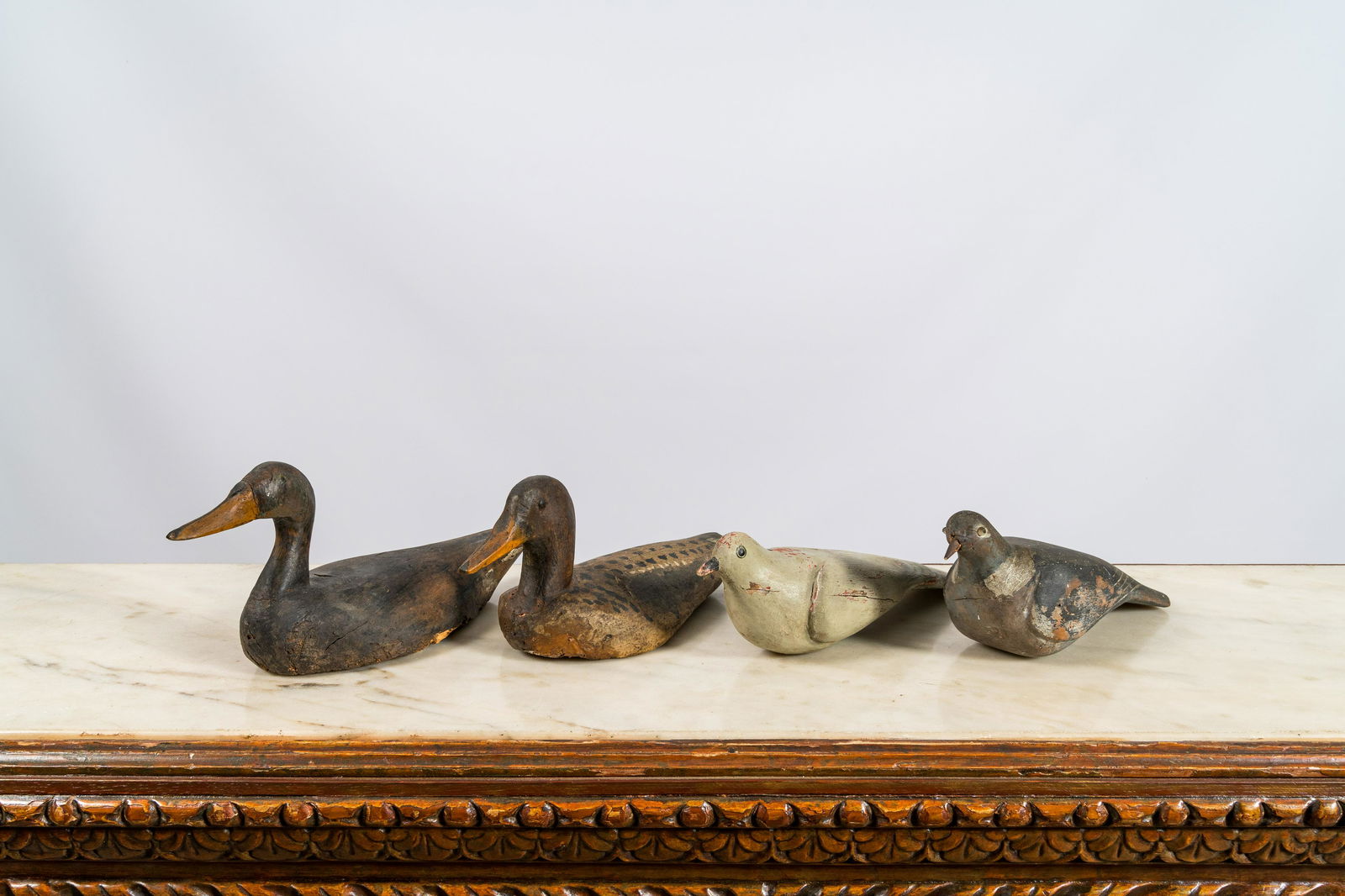 Two polychrome wooden decoy ducks and two pigeons, 19/20th C. (1 of 3)