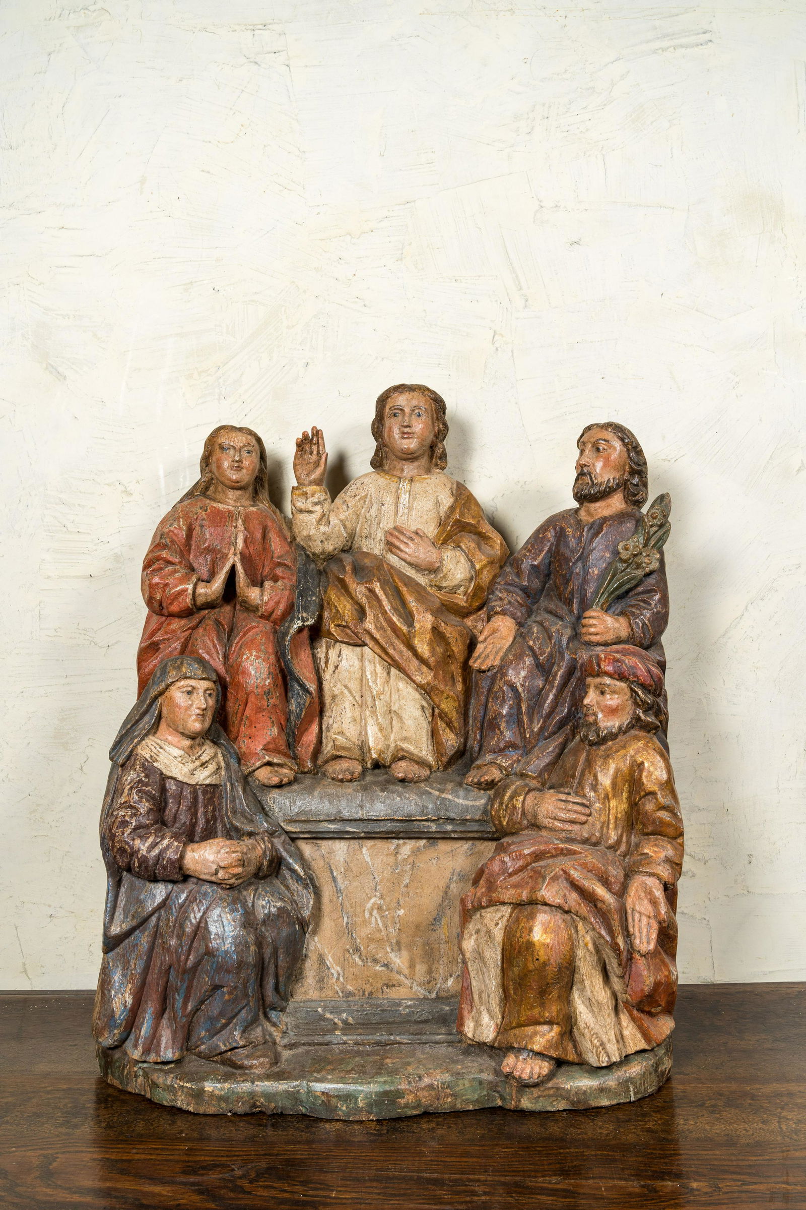 A polychrome wooden retable fragment depicting the 'Holy Family', Spain, 17h C. (1 of 5)