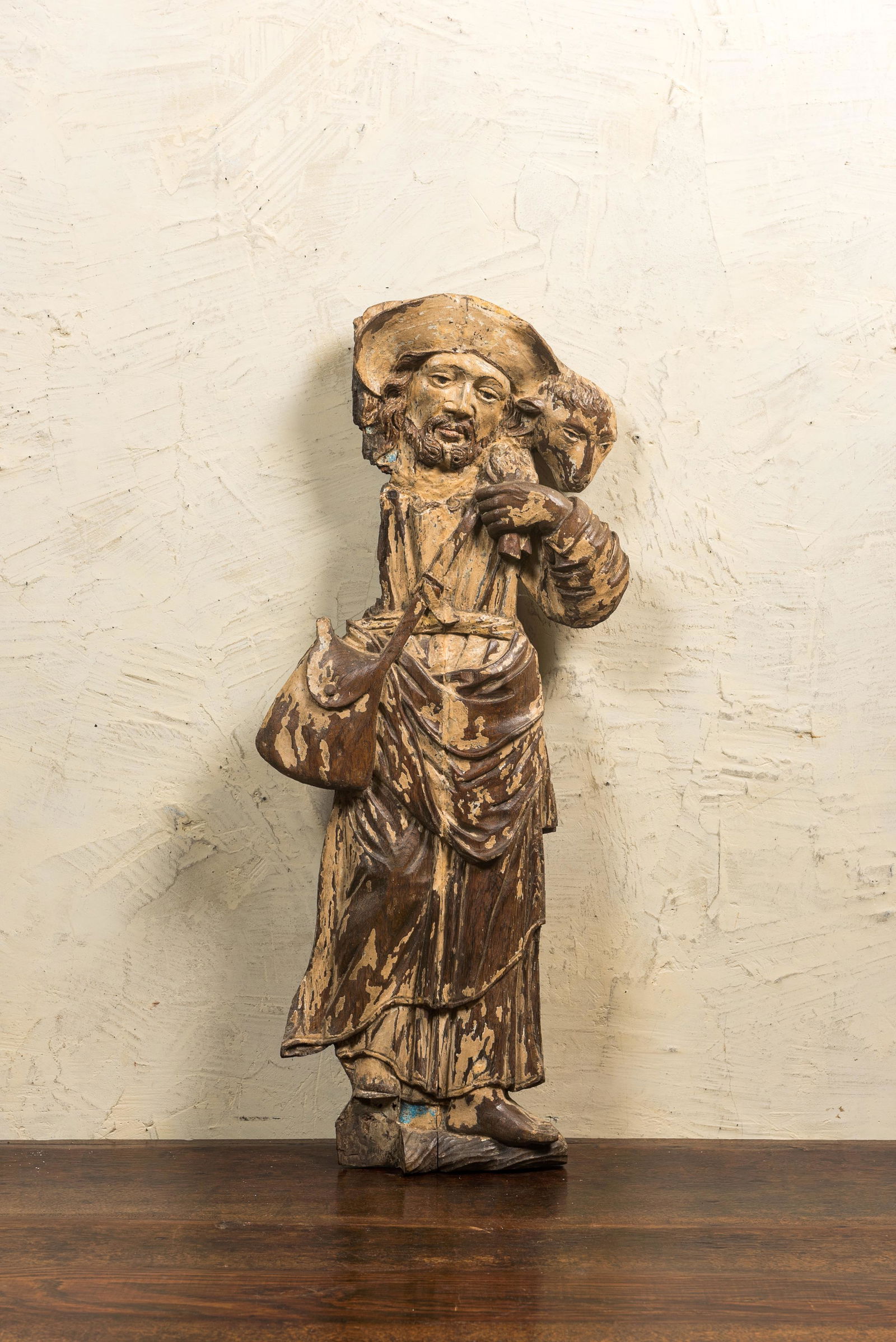 A large oak wooden figure of Jesus the Good Shepherd with traces of polychromy, late 16th C. (1 of 3)