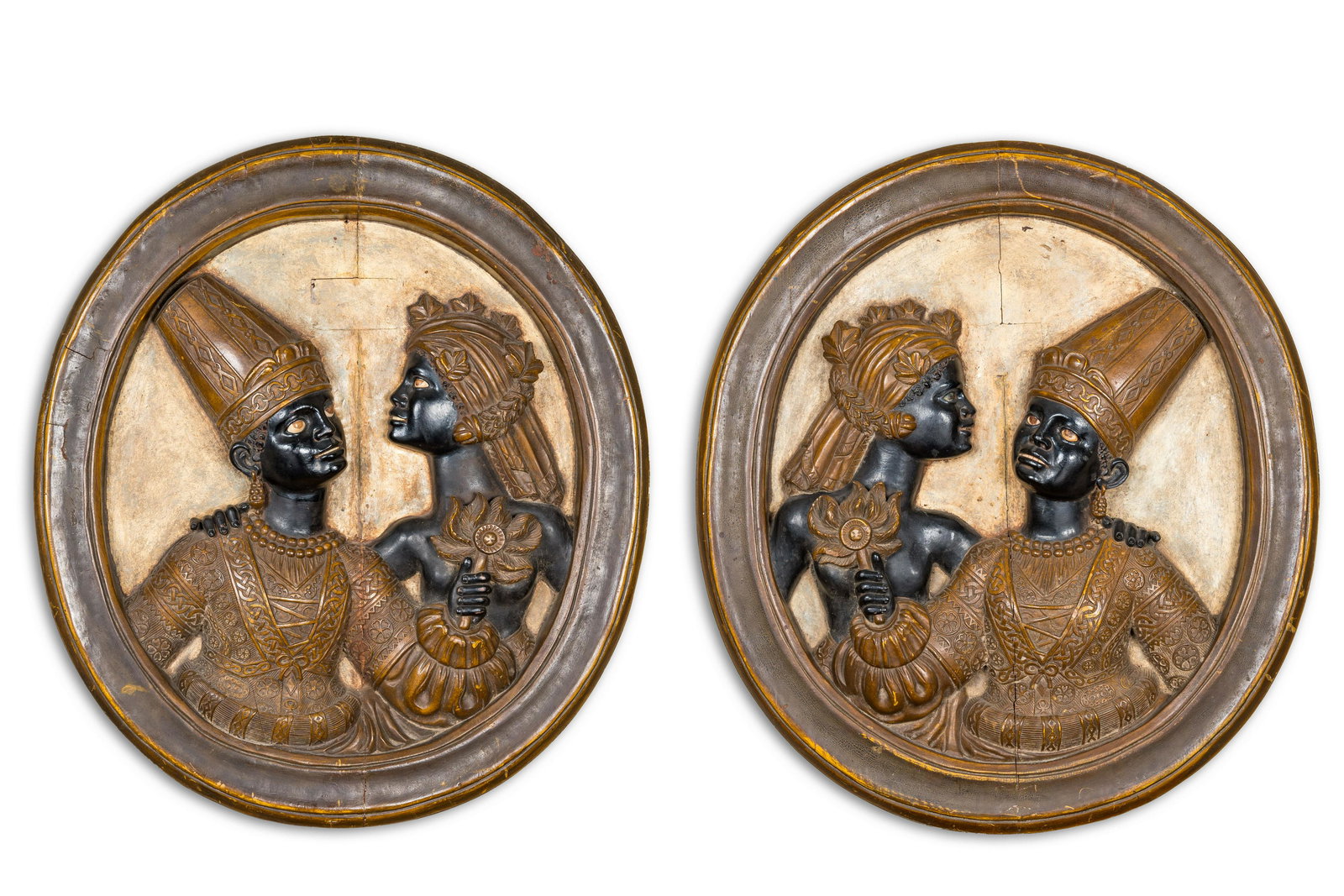 A pair of Italian oval wooden medallions with a Moorish couple, probably Venice, 19th C.: Full title: A pair of Italian oval wooden medallions with a Moorish couple, probably Venice, 19th C. Description: H 84 x L 76 cm