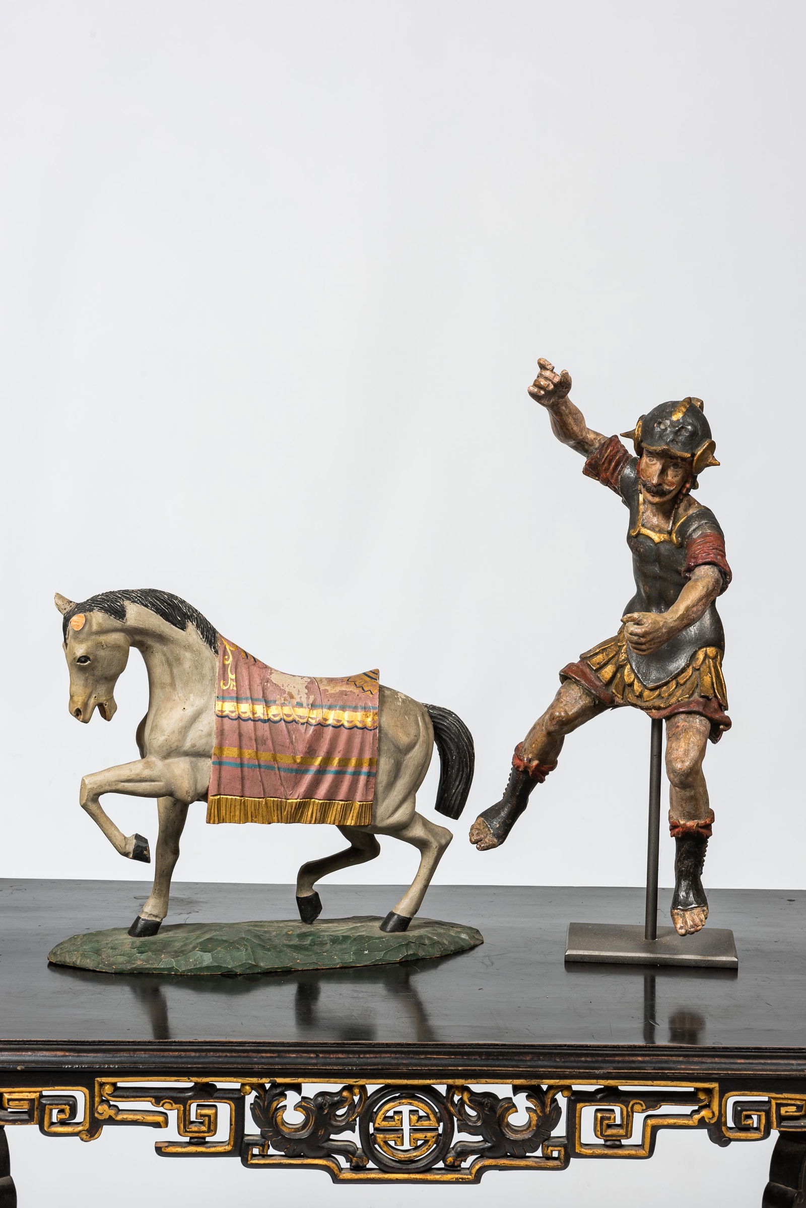 Two polychrome wooden figures of a Roman soldier and a horse, 17/18th C. (1 of 4)