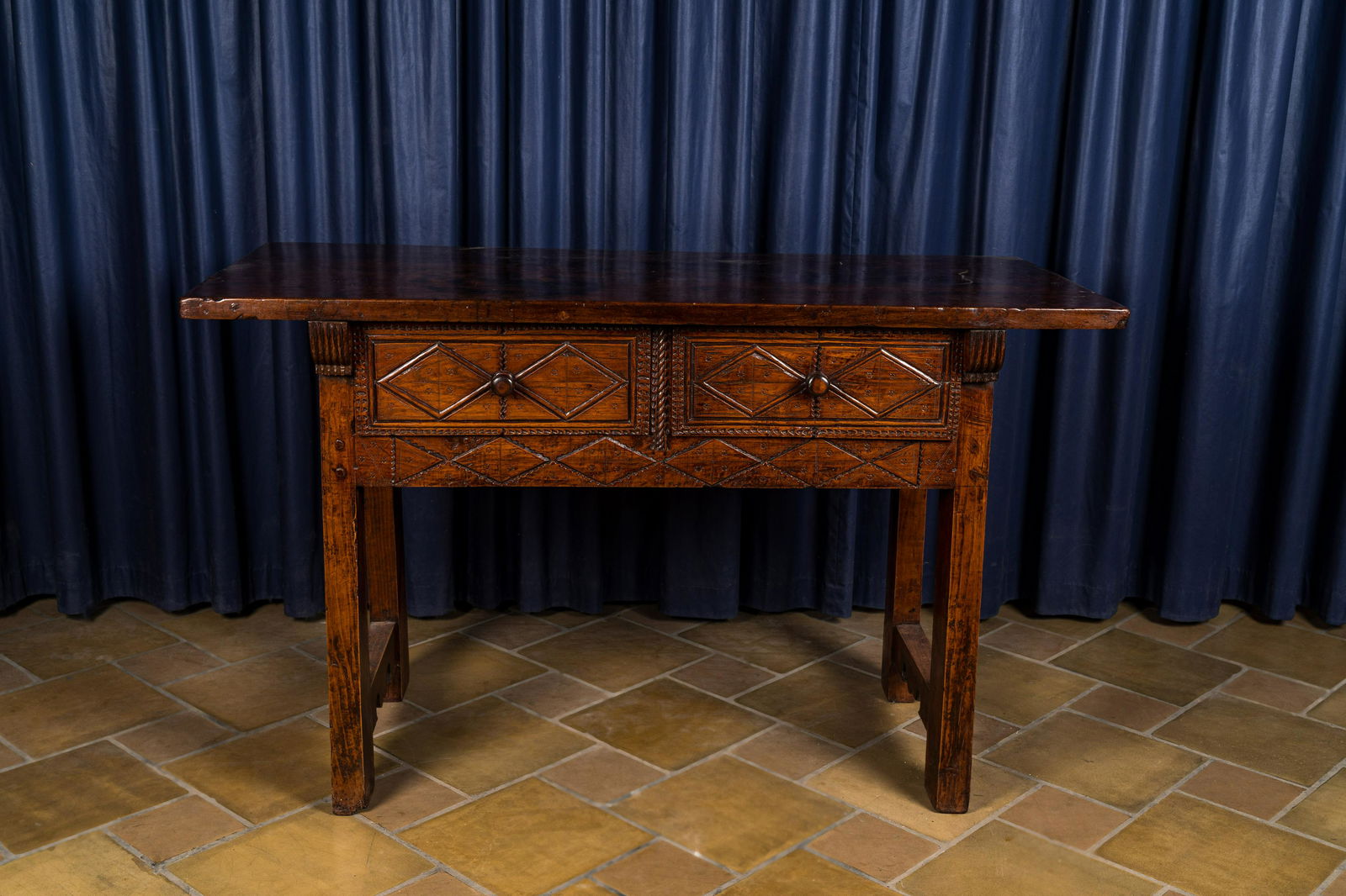 A Spanish walnut table with two drawers, 17th C. (1 of 4)
